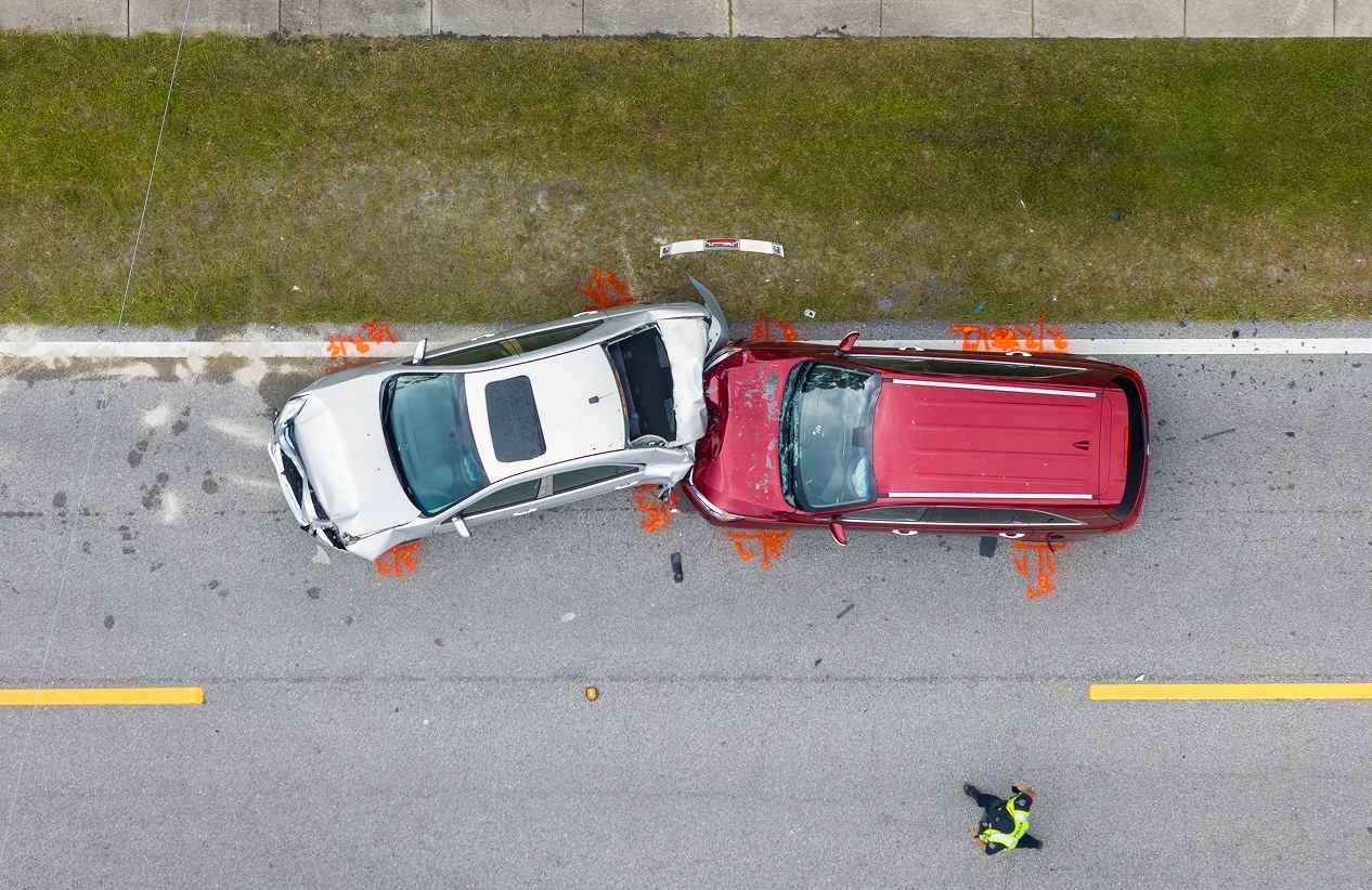 two cars in an accident on the road