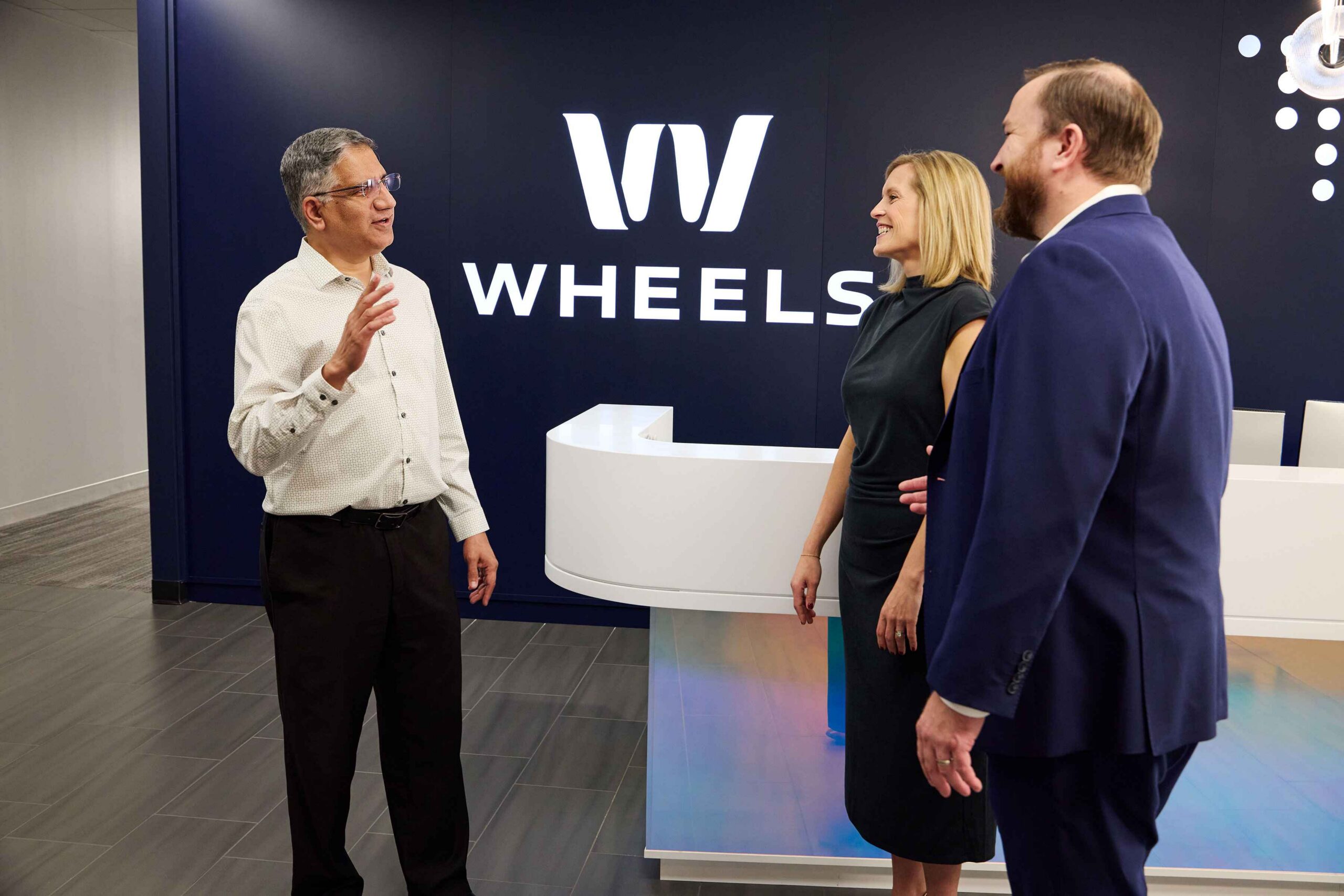 Wheels employees in lobby of headquarters