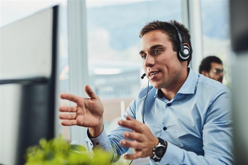 Male with headphone talking on phone