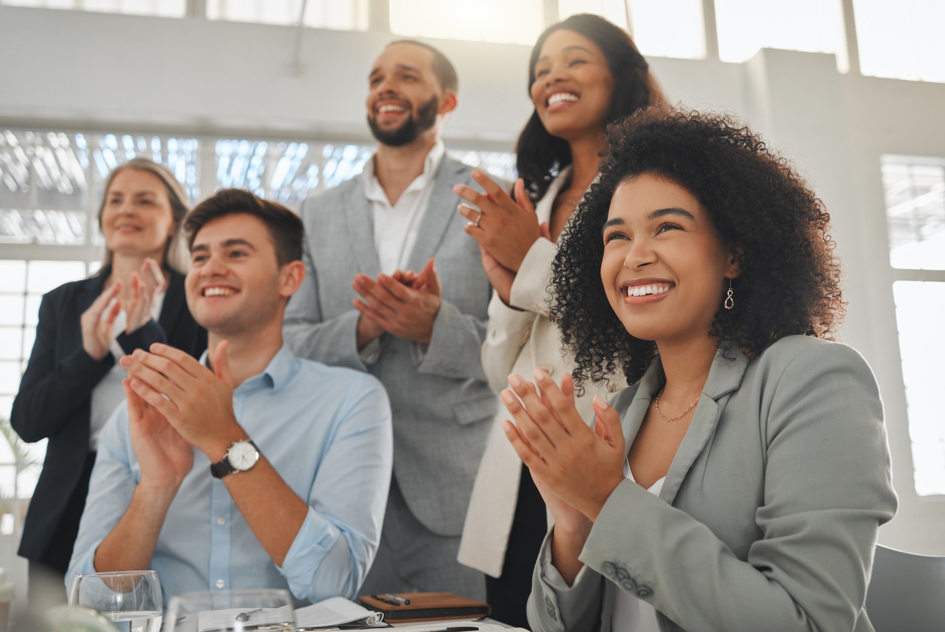 business_people_team_group_clapping