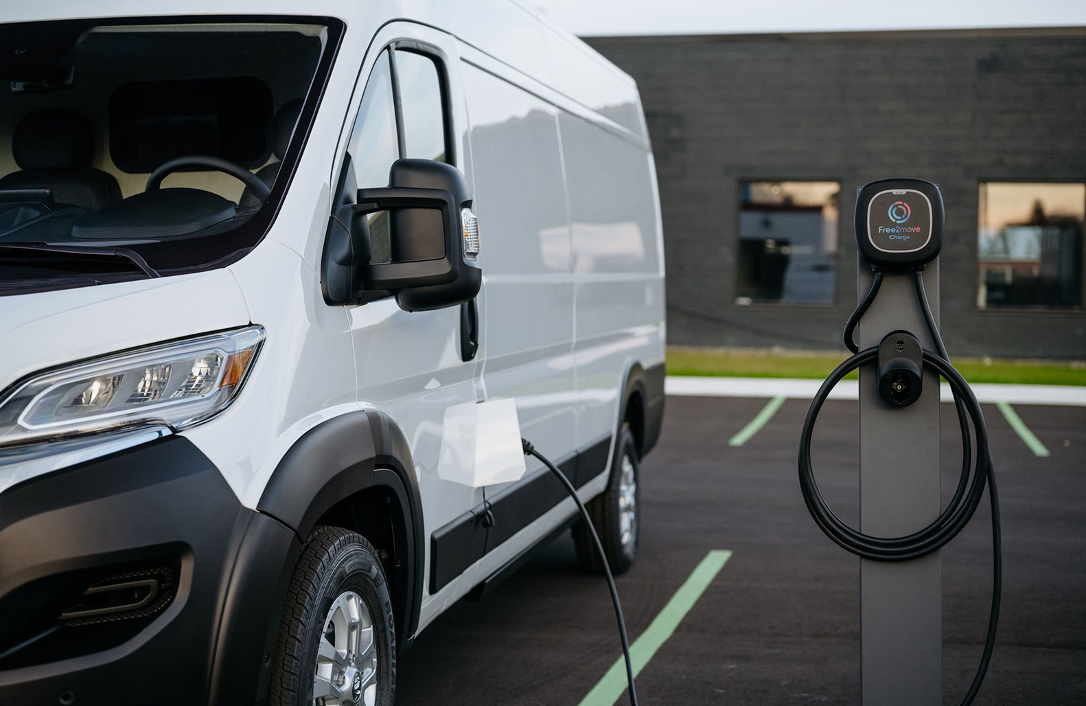 cargo van at electric charging station