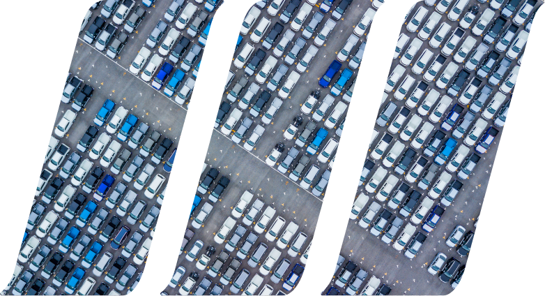 grid of cars parked in a parking lot