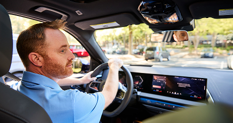 Image of car driving on road