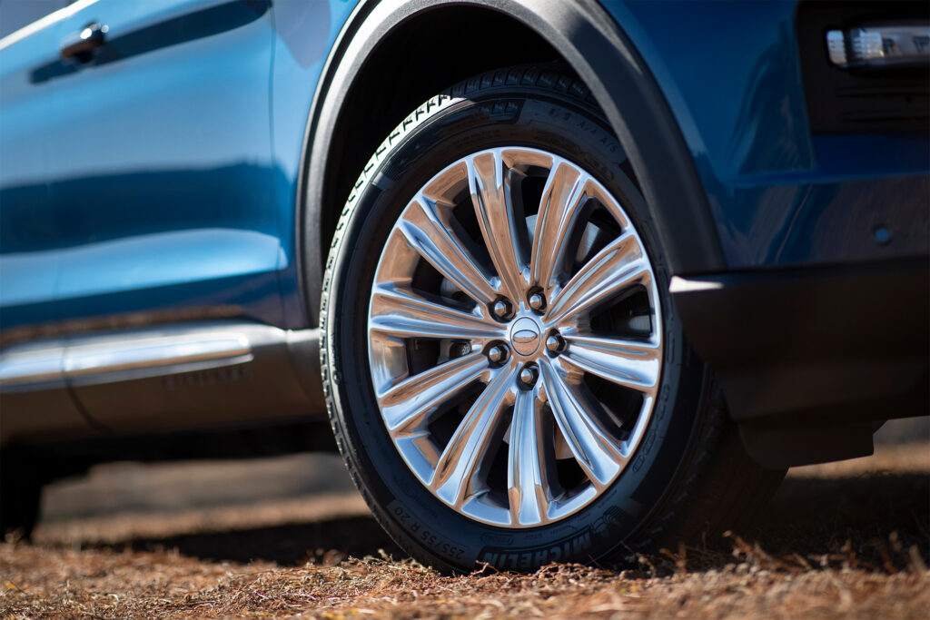 close up image of tire on blue SUV