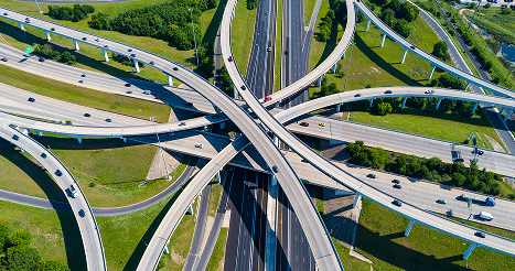 overhead view of vehicles on an interstate ramp