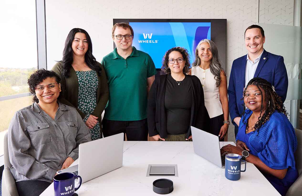 wheels employees in conference room
